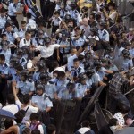 Thousands of pro-democracy protesters in Hong Kong undeterred by tear gas, barricades