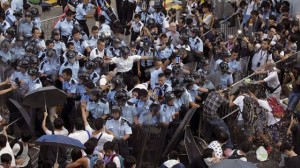 Thousands of pro-democracy protesters in Hong Kong undeterred by tear gas, barricades