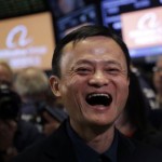 Alibaba's IPO debut roars, shares soar over 35%